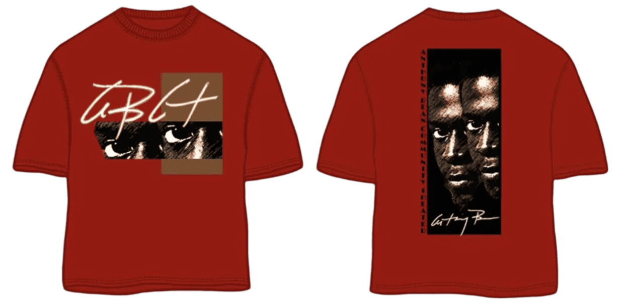 A red t-shirt with an image of a man 's face.