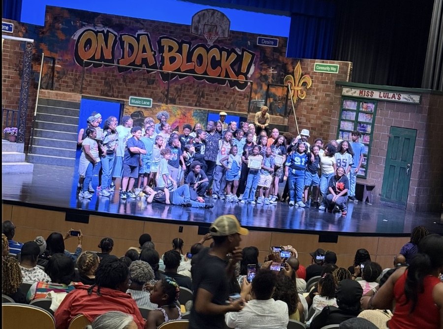 The ON DA BLOCK! cast on stage for the curtain call
